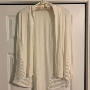 Cable and gauge cream lightweight cardigan with sheer detail on the sides.